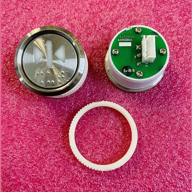 Кнопка ">I<" (с шрифтом Брайля, белая круговая подсветка, тип BAS231) A4N33841 Otis