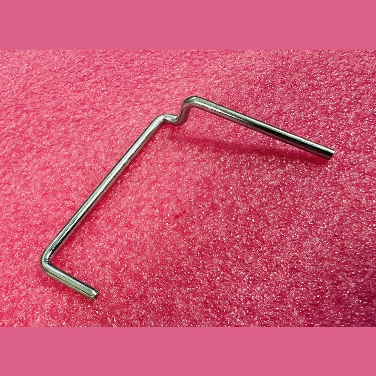 Пружина оси палеты траволатора левая GAA94BF2 Otis