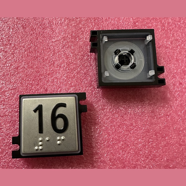 Толкатель кнопки с выдавленной надписью "16" шрифт Брайля Schindler